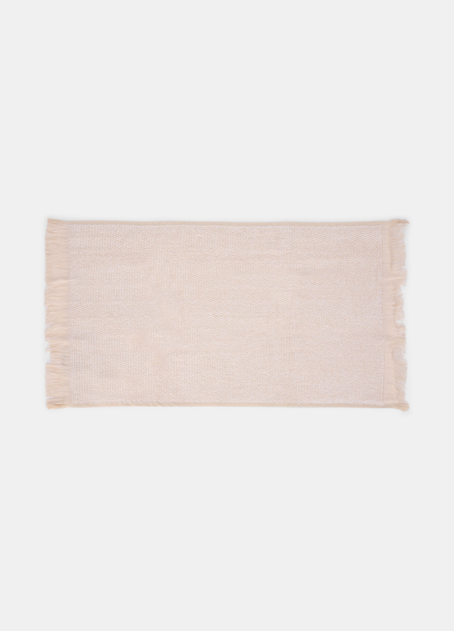 Cotton bath sheet with fringe trim